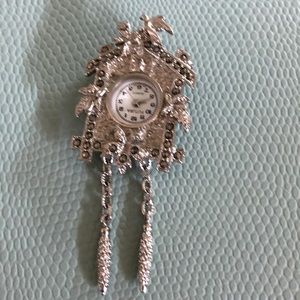 Silver cuckoo clock pin and pendant